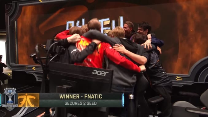 Fnatic celebrates after winning the last game of Group Stage Day 5